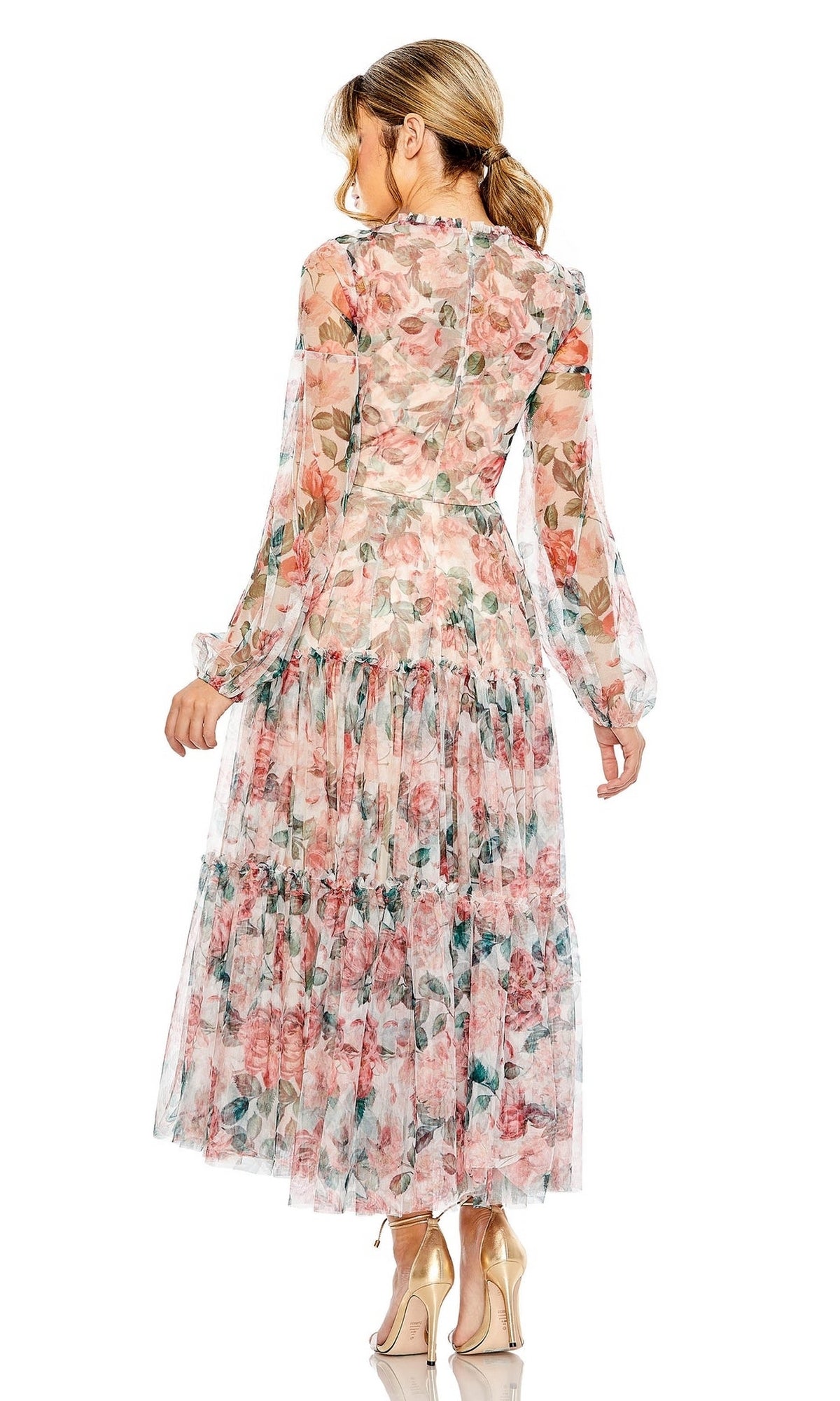 A woman in the Mac Duggal 11405 Floral-Print Midi Party Dress stands facing away, showcasing the semi-formal dress’s pleated skirt, long sleeves, flowing sheer fabric, and elegant back design.